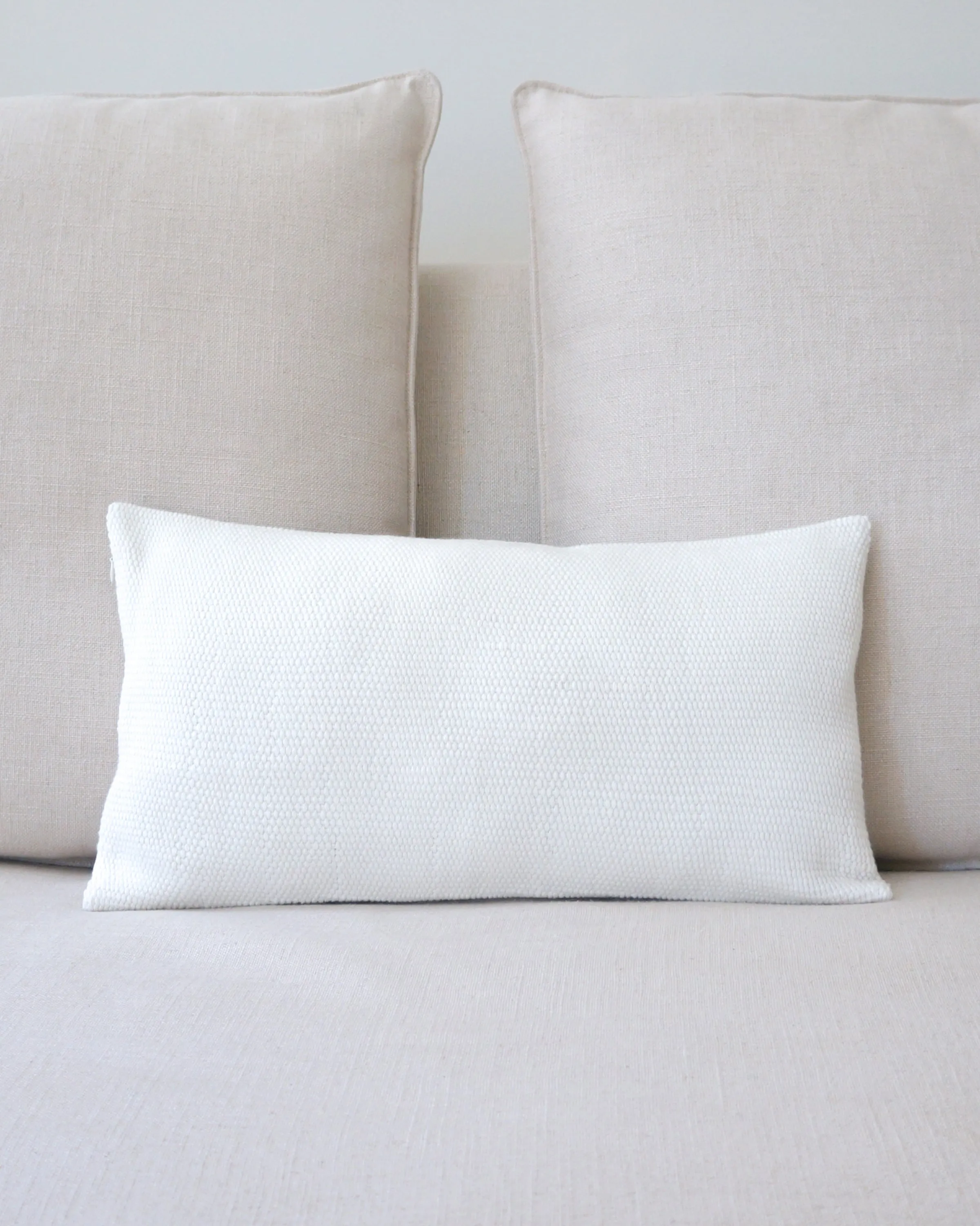 Solid Lumbar Pillow in Ivory Cotton